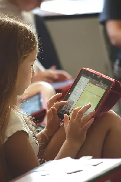 Students at Hinesburg Community School use their iPads during class.