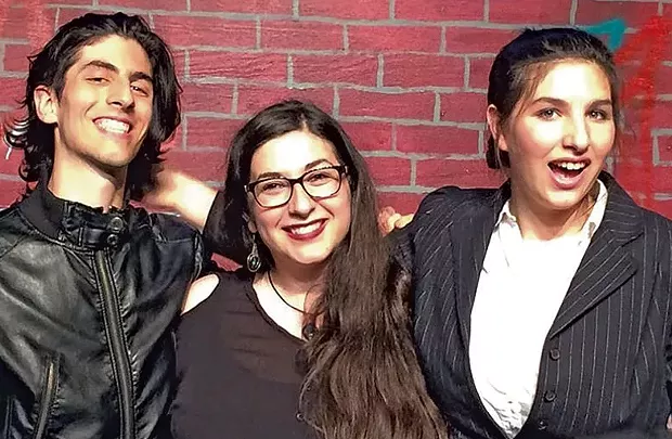 Sofie (center) with theater company members