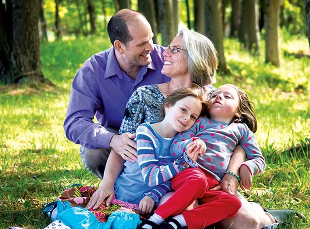 Sylvie and family - COURTESY OF LARISSA BARRESI PHOTOGRAPHY