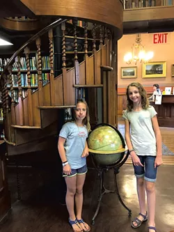 Gabriela and Lucia in front of the spiral staircase - MOLLY STANCIU
