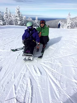 Garrett Richardson with instructor Andy Cook at Bolton Valley - COURTESY OF VALERIE RICHARDSON