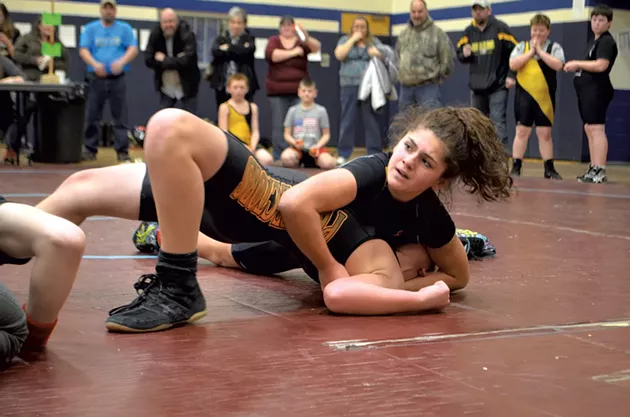 Lahna Descheneau of the Northeast Kingdom Pythons makes the winning move against an opponent from the St. Johnsbury Prospectors - CATHY RESMER
