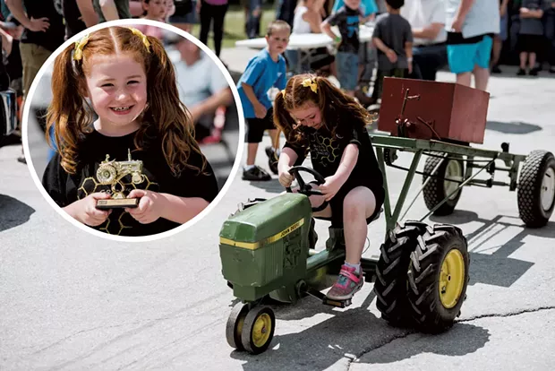 Aliana Talcott, 6, of Fairfield, gives it her all during the Pedal Pull. - SAM SIMON