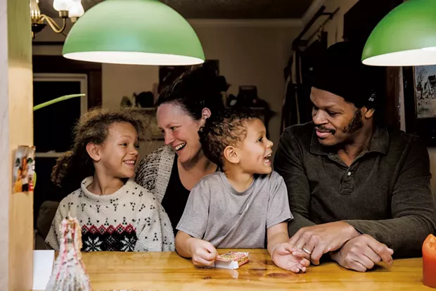 Mikey van Gulden, 50, and Jackie Reno van Gulden, 33, of Burlington, with daughter Josie, 8, and son Langston, 6 - SAM SIMON