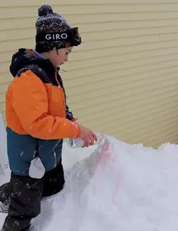 Zac erupts a snow volcano - COURTESY OF JANET FRANZ