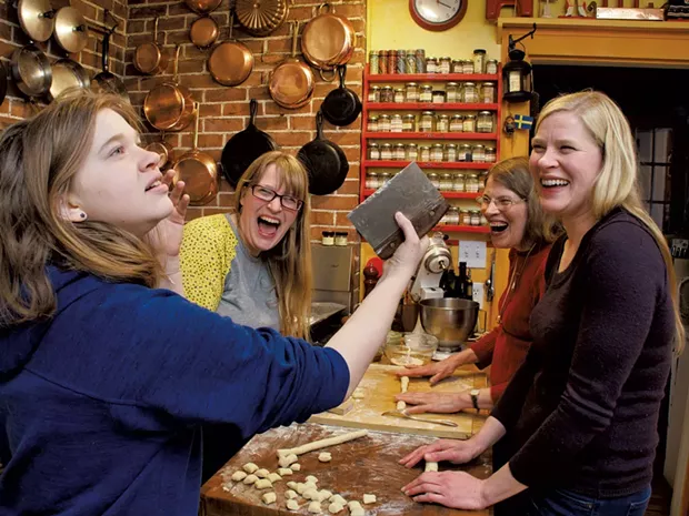 Astrid (second from left) makes gnocchi with her daughter, mom and sister - ANDY BRUMBAUGH