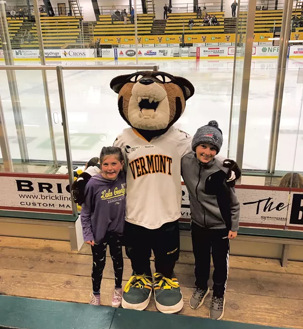 Heather's son, Henry, and his friend Sydney meet Rally Cat - HEATHER POLIFKA-RIVAS