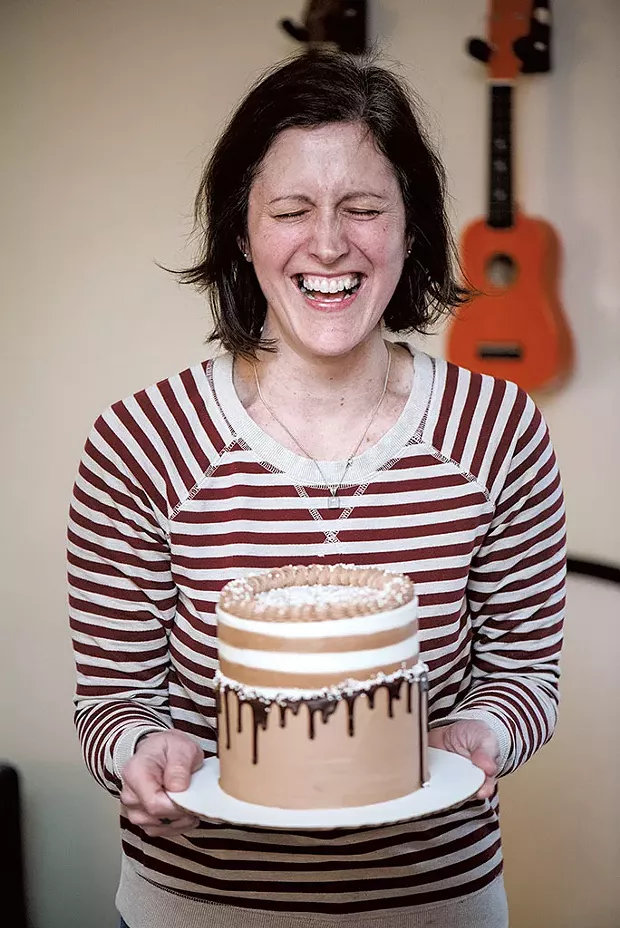 Erinn with a cake she made for daughter Sadie - SAM SIMON