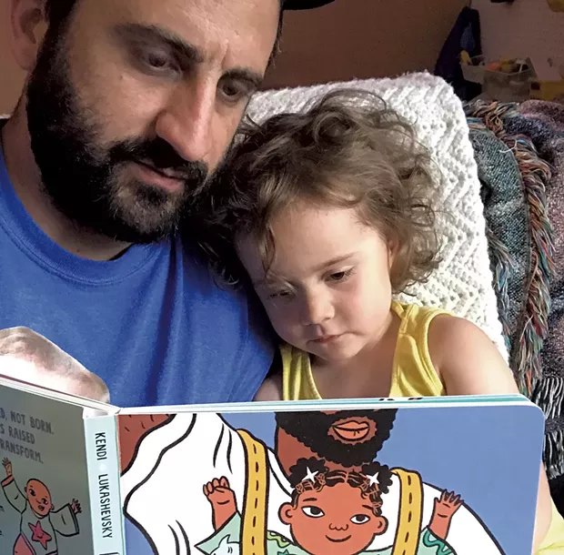 Keegan and Penelope reading Ibram X. Kendi's Antiracist Baby - KEEGAN ALBAUGH