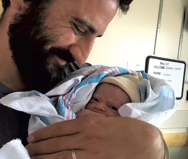 Keegan and newborn Coraline - COURTESY OF KEEGAN ALBAUGH
