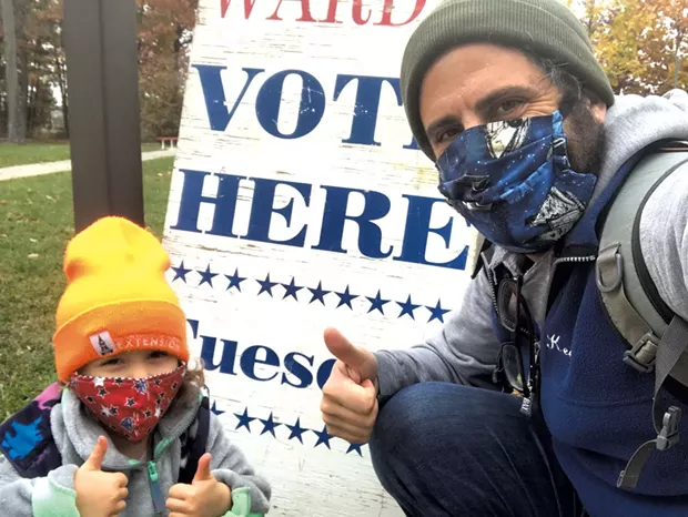 Albaugh voting with daughter Coraline - COURTESY OF KEEGAN ALBAUGH