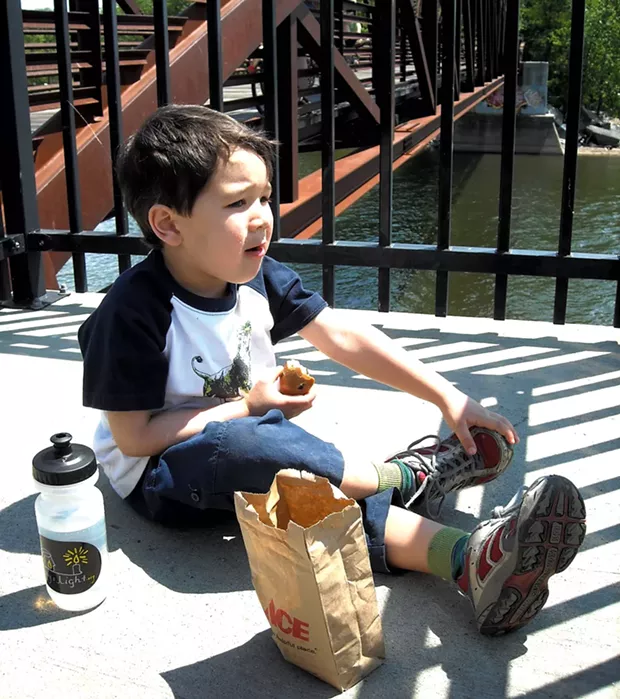 Snack break overlooking the Winooski River, 2012 - COURTESY OF HEATHER FITZGERALD