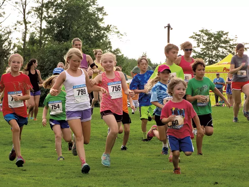 Kids take off at the start of Catamount's Tuesday Night Trail Running Series - MATTHEW THORSEN