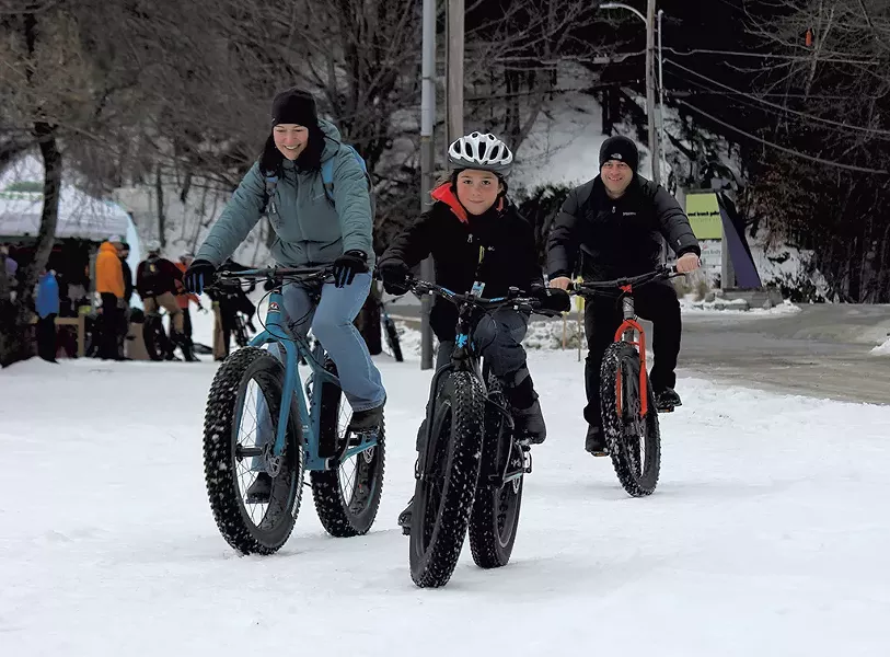 The Garbach family tries out fat bikes at the Überwintern festival in Stowe - TRISTAN VON DUNTZ