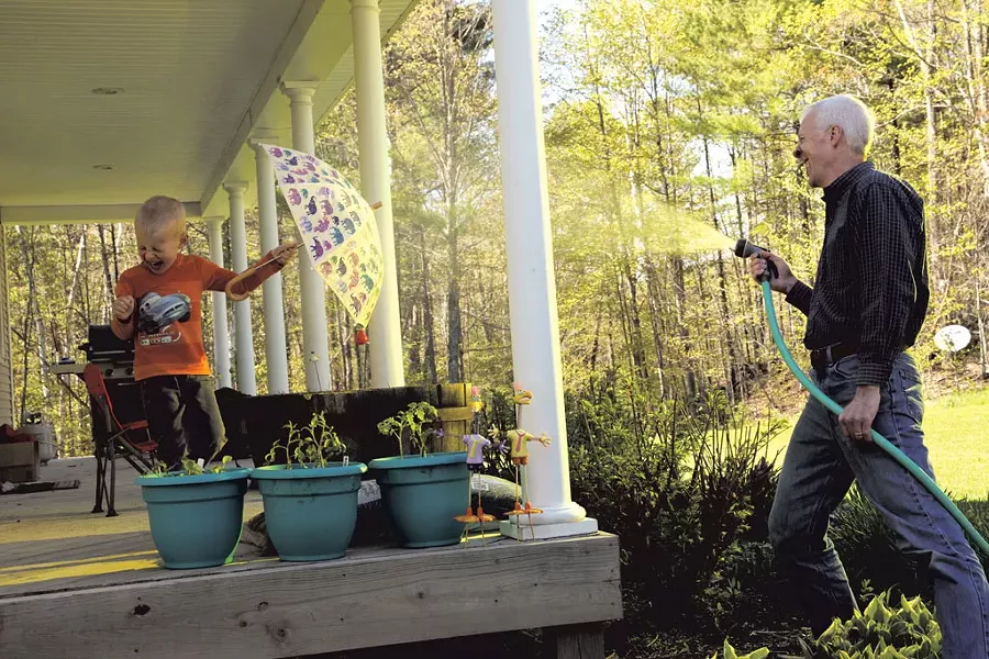 Michael Wheeler sprays son Elliot - MATTHEW THORSEN