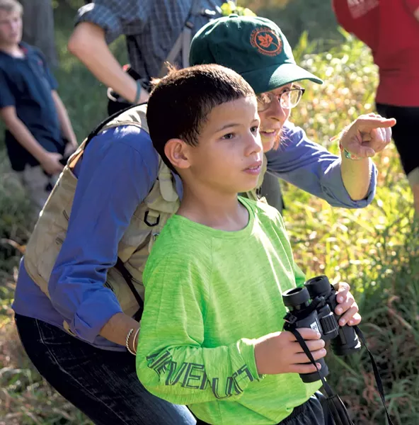 UVM lecturer Trish O’Kane and Flynn fifth grader Yadiel - KEN PICARD