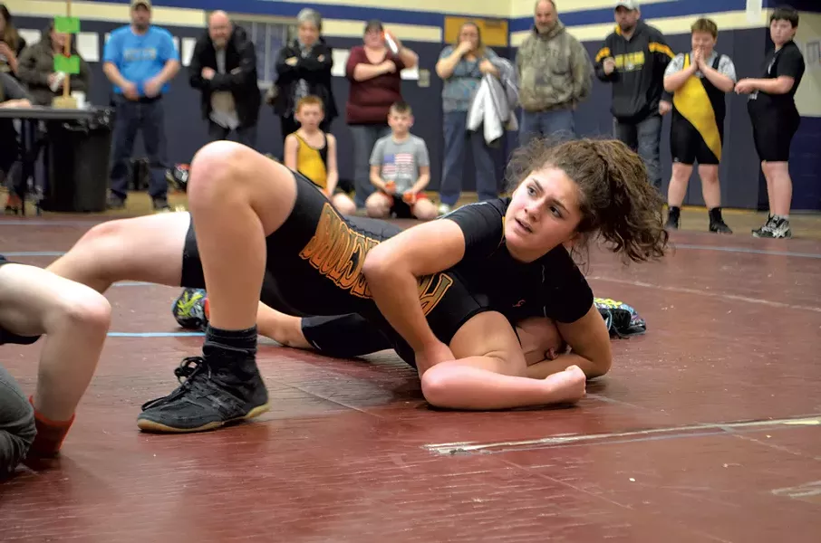 Lahna Descheneau of the Northeast Kingdom Pythons makes the winning move against an opponent from the St. Johnsbury Prospectors - CATHY RESMER