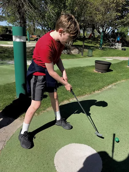 Felix takes a swing - COURTESY OF BENJAMIN ROESCH
