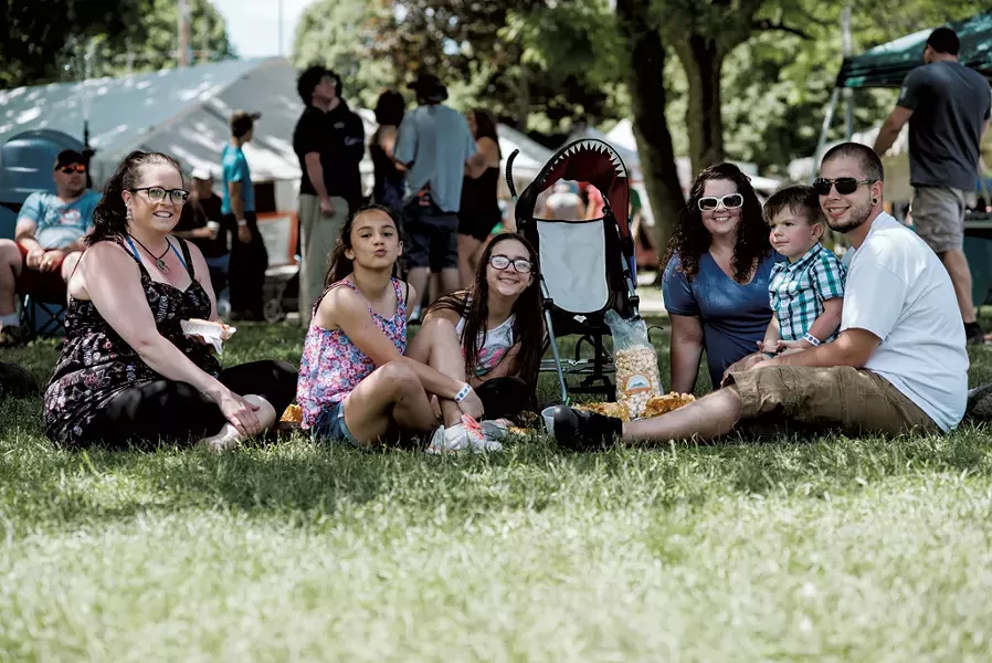 Briana Dragon, 11, of Franklin, and Angelus Porter, 10, and Spencer Porter, 2, of Highgate with their parents - SAM SIMON