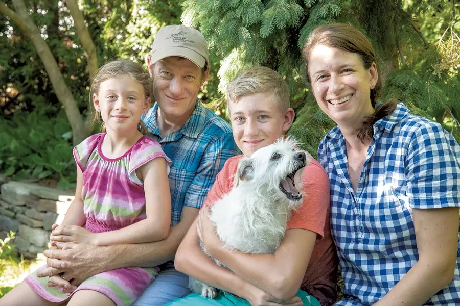 Mavis, Nate, Sawyer and Stacy with their dog, Fergus - JAMES BUCK