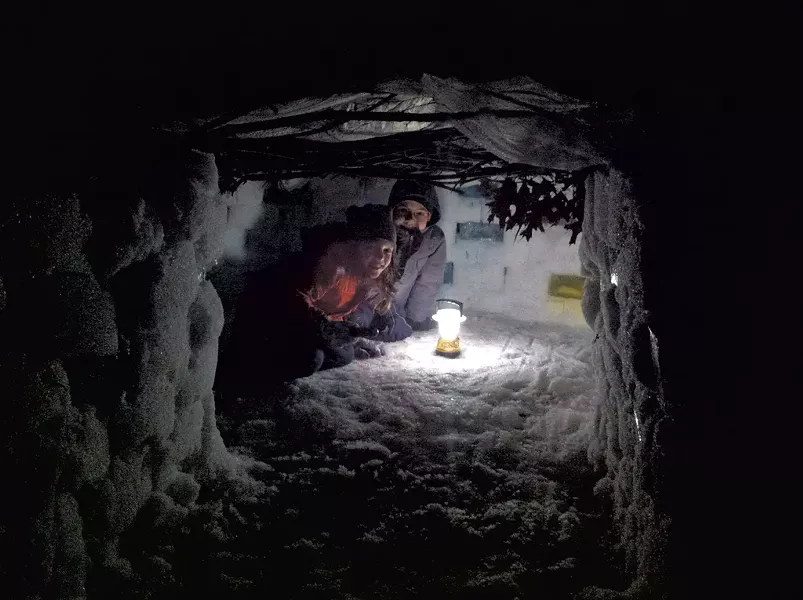 Kimberly Harrington’s - children, Hawthorne and - Walker Hughes, in their igloo - COURTESY OF KIMBERLY HARRINGTON