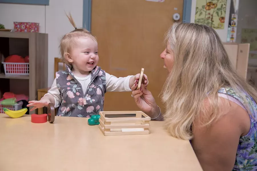 Learning to share in the Early Head Start classroom at Milton Family Community Center - COURTESY OF CHAMPLAIN VALLEY HEAD START