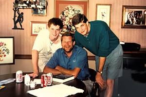 Benjamin (left) with his dad and brother