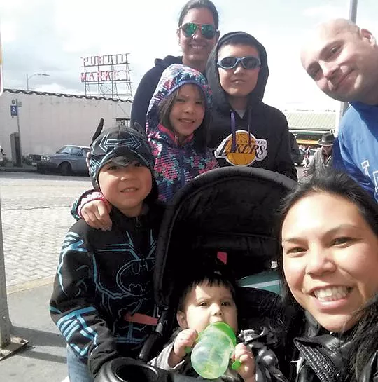 The Nystrom family with au pair Daris Diaz (top)
