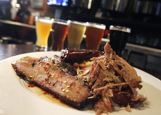 &quot;Combo Platter&quot; with smoked brisket, pulled pork, and bock-braised baby-back ribs from Blue Tractor in Ann Arbor. - MT PHOTO: ROB WIDDIS