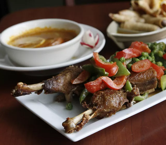 Pa-nang duck, tom yum gai soup, and assorted appetizers from Orchid Thai. - MT PHOTO: ROB WIDDIS