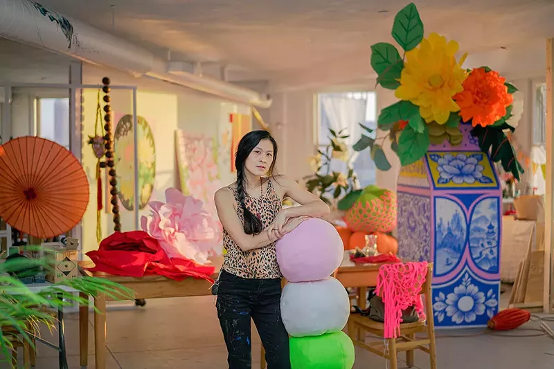 Louise Jones, aka Ouizi, puts the finishing touches on her installation for Movement Music Festival. - NOAH ELLIOTT MORRISON