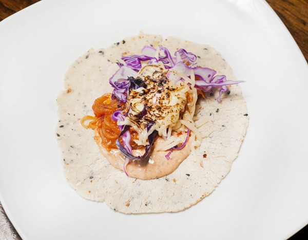 Brujo's vegeterian barbacoa taco with seared spaghetti squash that's tossed with barbacoa sauce, red cabbage ensalata, chipotle mayo, and Chihuahua cheese. - TOM PERKINS