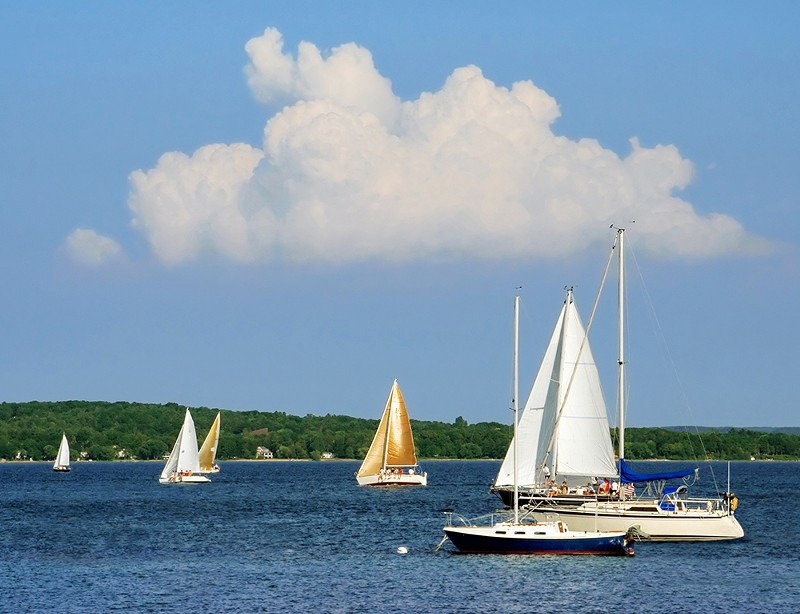 Sailboats on the blue water of Grand Traverse Bay. - COURTESY PHOTO