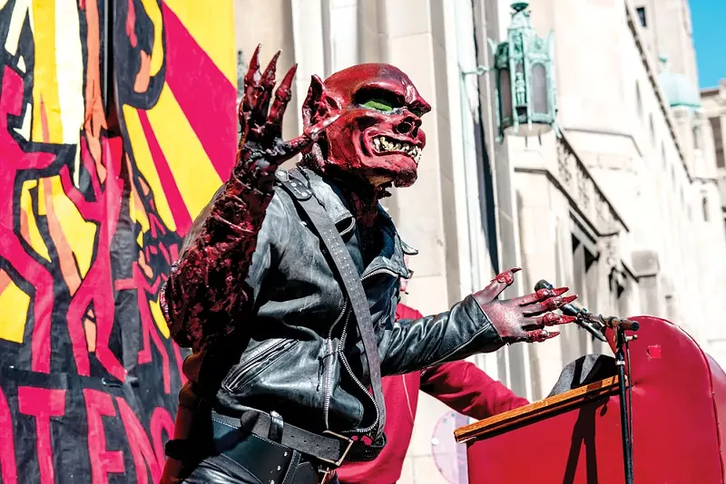 The "Red Dwarf" speaks at the Marche du Nain Rouge, 2015. - COURTESY OF MARCHE DU NAIN ROUGE