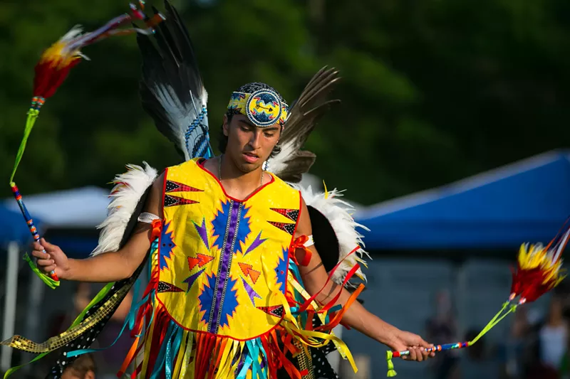 A young male fancy dancer at the Little River Band of Ottawa Indians annual Pow wow, in full regalia. - DARLENE STANLEY / SHUTTERSTOCK.COM