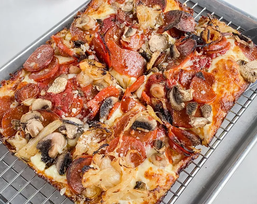 “The Granny” from Como's, with pepperoni, mushrooms, and caramelized onions. - TOM PERKINS