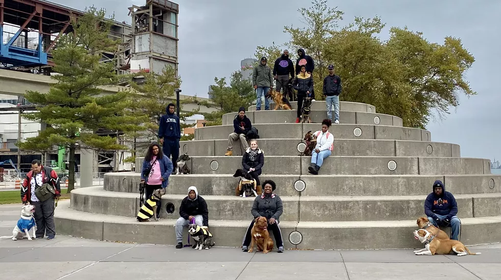 Motor City K9 Solutions hosted a recent dog walk in Detroit to help promote the importance of socializing dogs. - COURTESY OF MOTOR CITY K9 SOLUTIONS