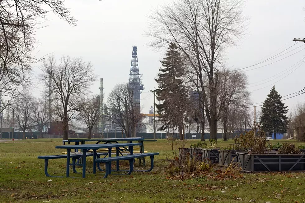 A park in the shadow of Marathon's oil refinery. - STEVE NEAVLING