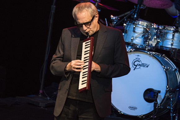 Steely Dan's Donald Fagen plays a melodica during a Wednesday show at DTE Energy Music Theater. - PHOTO BY MIKE FERDINANDE.