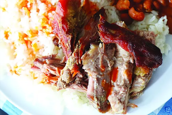 PERNIL, ROASTED PORK SHOULDER WITH WHITE RICE AND WHOLE BEANS. | PHOTO/SCOTT SPELLMAN