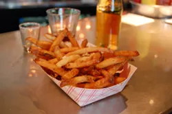 The cooked-in-lard garlic fries at Mercury Burger Bar just got a bit more approachable. - PHOTO BY MICHAEL JACKMAN
