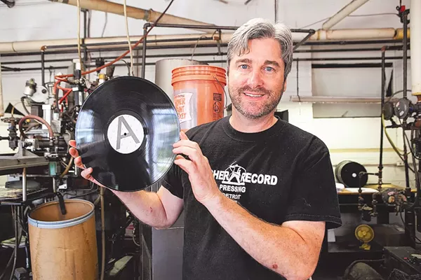 MIKE ARCHER AT HIS RECORD PRESSING PLANT. METRO TIMES FILE PHOTO.