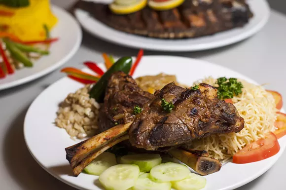 Michui (grilled lamb shanks). - TOM PERKINS