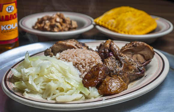 Jerk chicken at Rono's. - PHOTO BY TOM PERKINS
