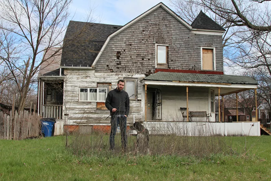 Drew Philp, left, and his dog, Gratiot. - SARAH RAHAL