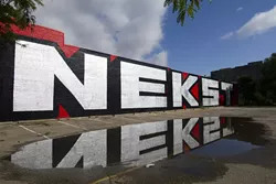 A commissioned graffiti piece formerly on the MOCAD. - STEVE NEAVLING