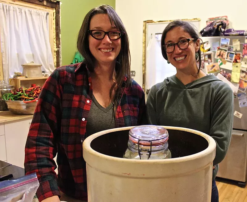 Alison Heeres (left) and Gwen Meyer of Coriander Kitchen and Farm, in the midst of a fermentation frenzy. - SARAH ROSE SHARP