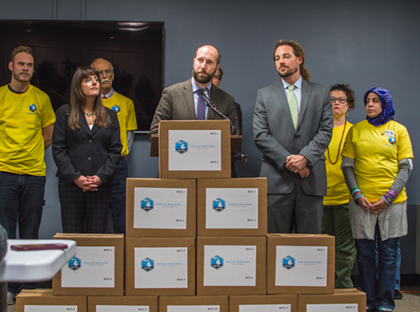 The Coalition to Regulate Marijuana Like Alcohol submits 365,000 petition signatures in support of marijuana legalization to the state Board of Canvassers on Nov 20, 2017. - COURTESY PHOTO