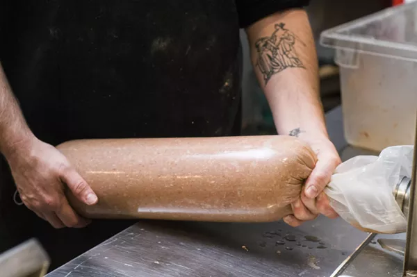 Packing bologna at Stache. - TOM PERKINS
