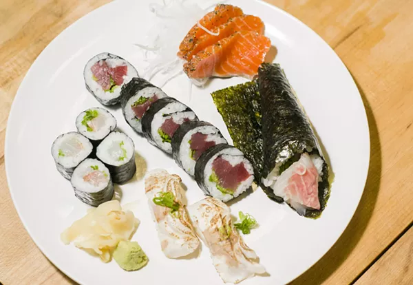 (Counterclockwise from left) Sea bream, yellowfin tuna, steelhead trout, and alfonsino prepared by Dr. Sushi and sourced from Motor City Seafood. - TOM PERKINS